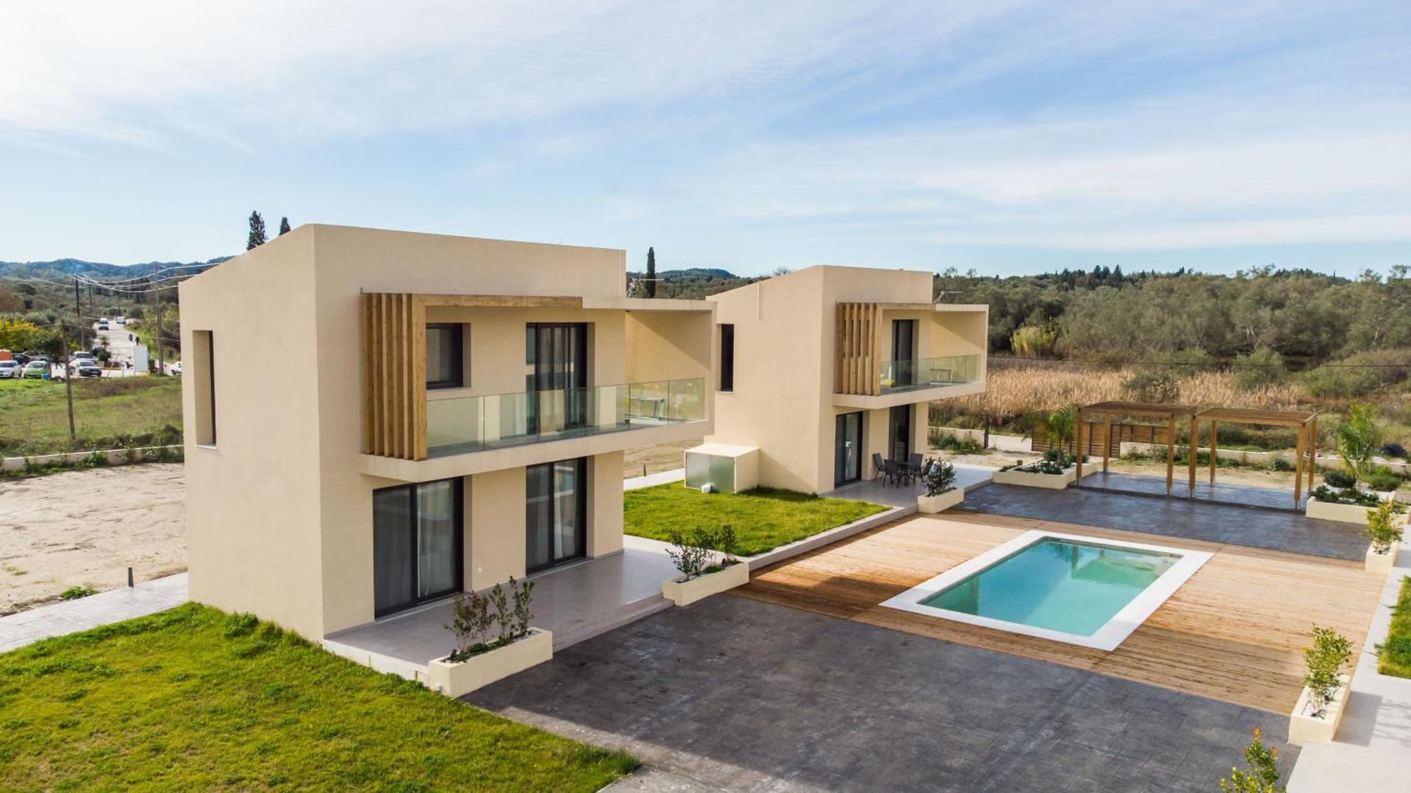 G Quattro Luxury Hébergement de vacances Lefkimi